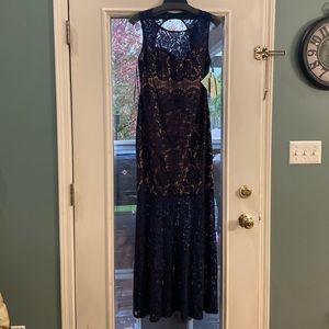 Navy blue lace evening dress by Nightway
